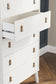 Aprilyn Queen Bookcase Headboard with Dresser, Chest and Nightstand